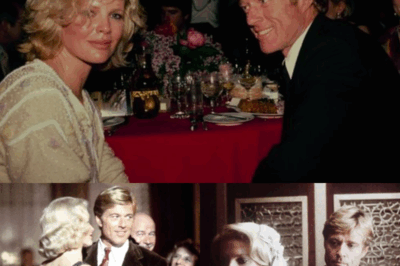 Robert Redford and Kim Basinger, side by side at a dinner party for The Natural (1984) — a moment of timeless Hollywood elegance.